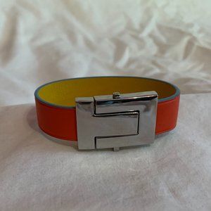 MAGNETIC ORANGE TORY BURCH T-LOCK BRACELET